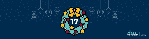 A festive wreath with a number seventeen in the centre on a dark blue background with snowflakes and hanging baubles